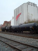 ADM tank cars in front of the distinctive elevator